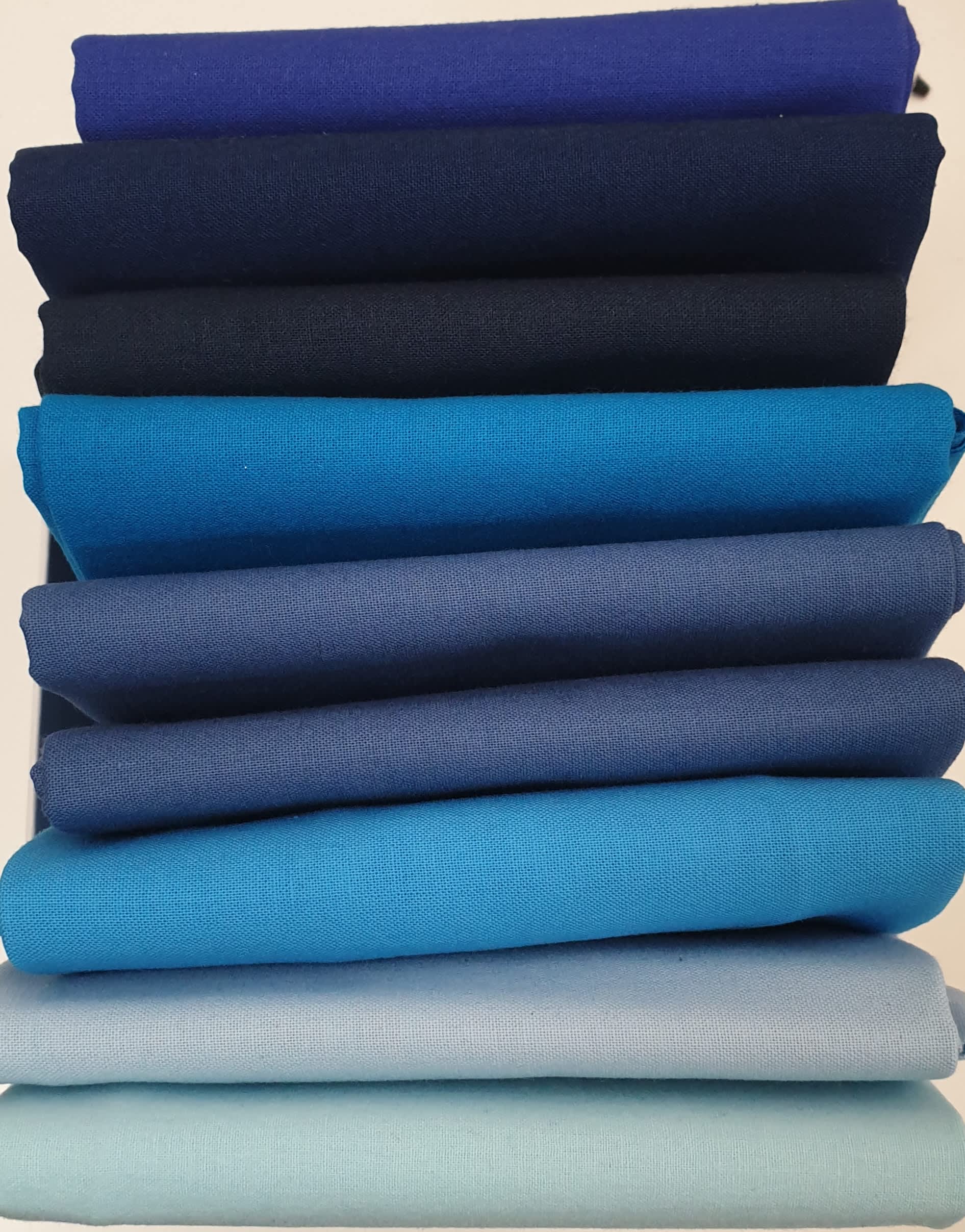 Solid Cool Blues Bundle Plain Fabric. 9 Fat Quarters incl. Midnight, Denim, Sea and Sky Blue Solid Cool Blues Bundle Plain Fabric. 9 Fat Quarters incl. Midnight, Denim, Sea and Sky Blue