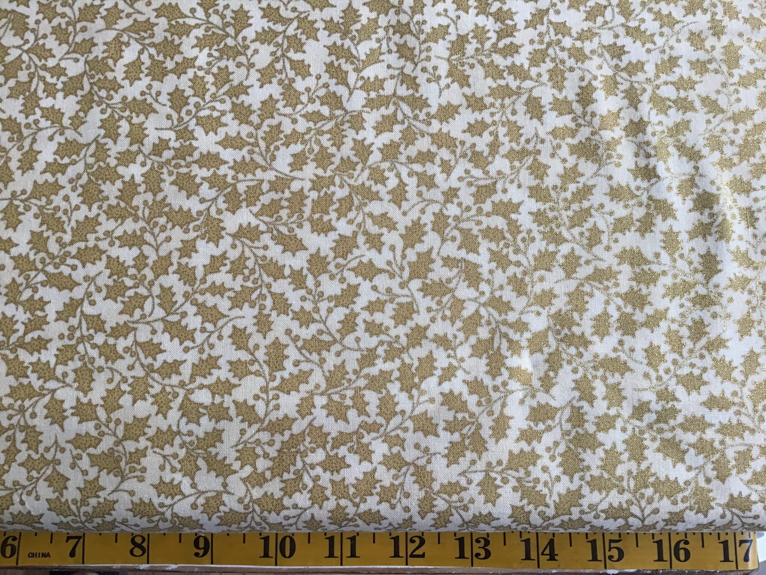 Poinsettias and Pine 3351511M Holly Gold on cream by Moda Fabric Poinsettias and Pine 3351511M Holly Gold on cream by Moda Fabric