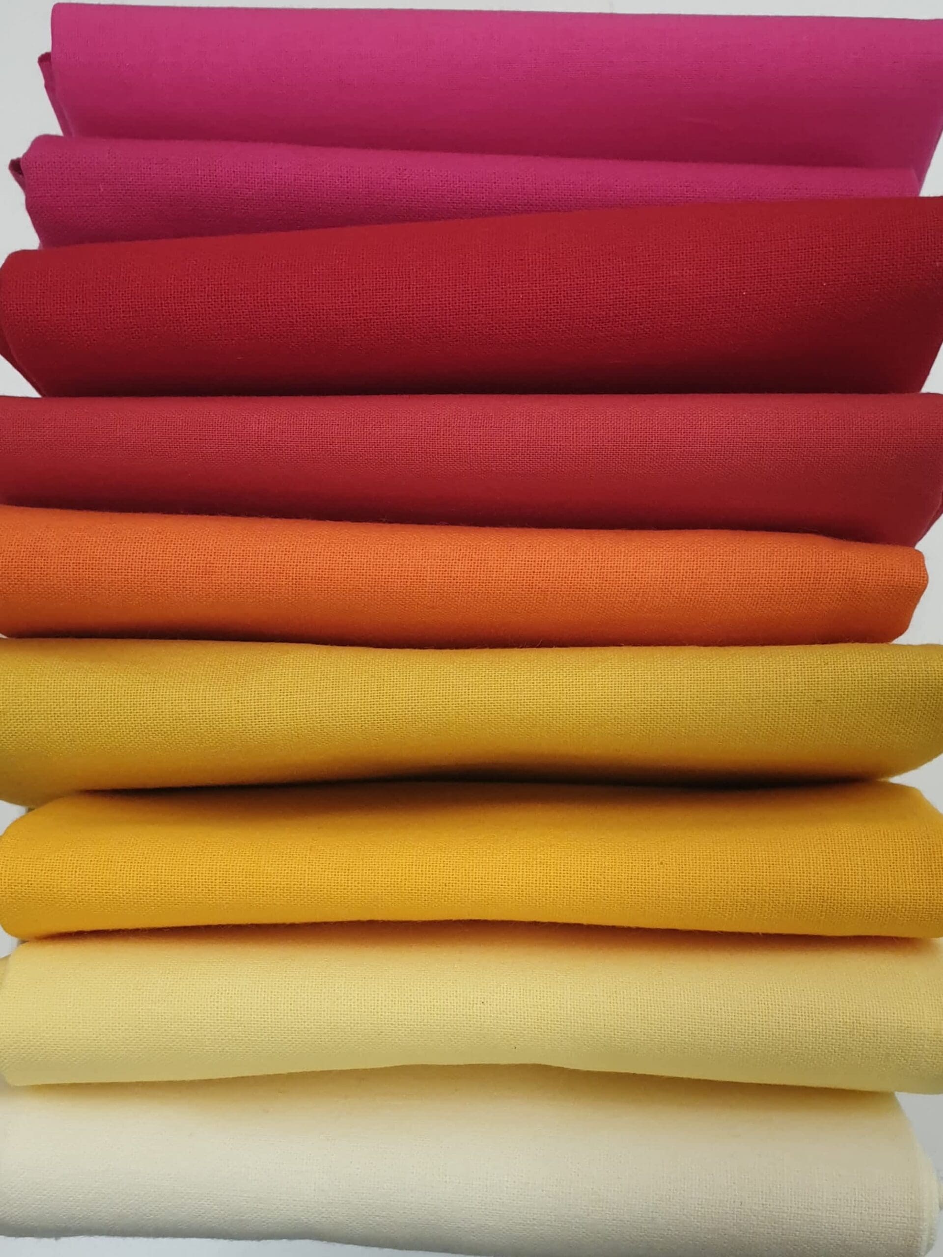Solid Warm Reds Bundle plain fabric. 9 Fat Quarters including Fuchsia, Orange, Gold Yellow Solid Warm Reds Bundle Plain Fabric. 9 Fat Quarters Including Fuchsia, Orange, Gold Yellow