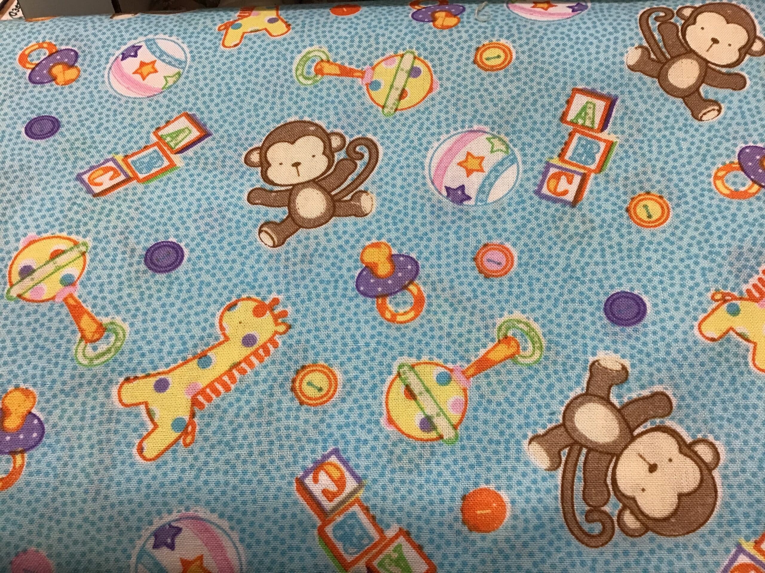 BABY MONKEY & Giraffe on blue fabric BABY MONKEY & Giraffe on blue fabric