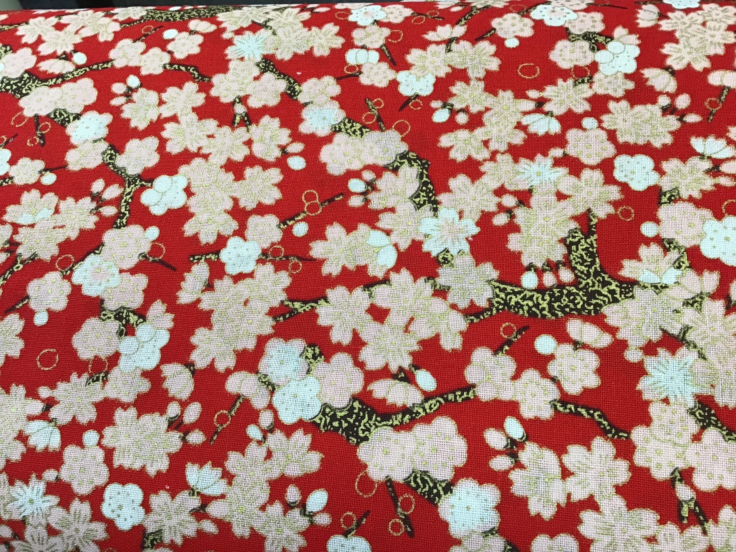 Cherry Blossom PO2641 Pink white gold on Red fabric. 54” fabric Cherry Blossom PO2641 Pink white gold on Red fabric. 54” fabric
