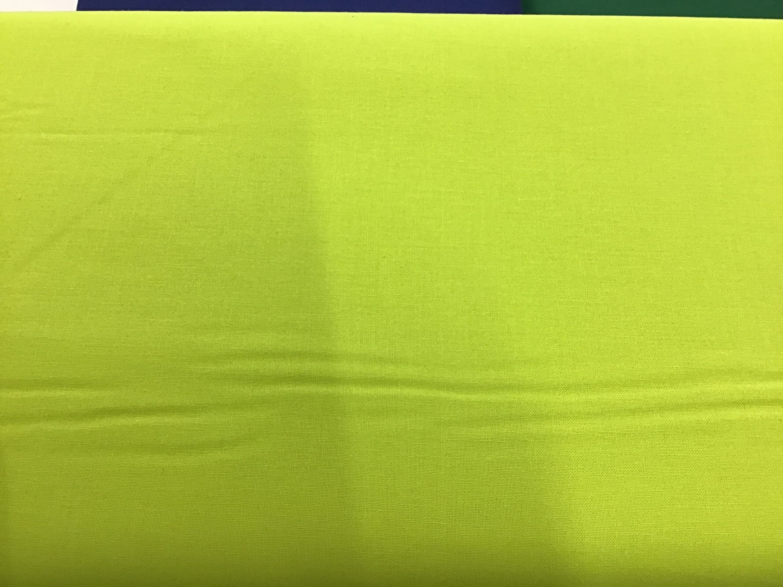2000G21 Bright Lime Green plain solid fabric from Makower 2000G21 Bright Lime Green plain solid fabric from Makower