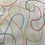Squiggle 785501 Rainbow on White Extra wide 108″ wide backing fabric