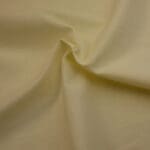 Plain Cream solid fabric by Reynard