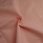 Plain Petal Pink Solid fabric by Reynard