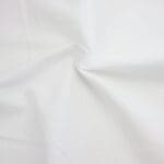 Plain white solid fabric by Reynard