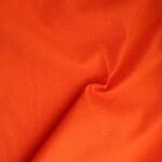 Solid Orange plain fabric by Reynard