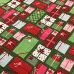 Craft Cotton – Merry and Bright –  C8392 Christmas presents on green background by Reynard