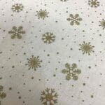 Craft Cotton Christmas print – 126 gold snowflake on natural background by Reynard