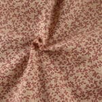 Ditsy Daisy natural/claret fabric by Reynard