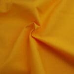 Plain Gold rich yellow solid fabric by Reynard